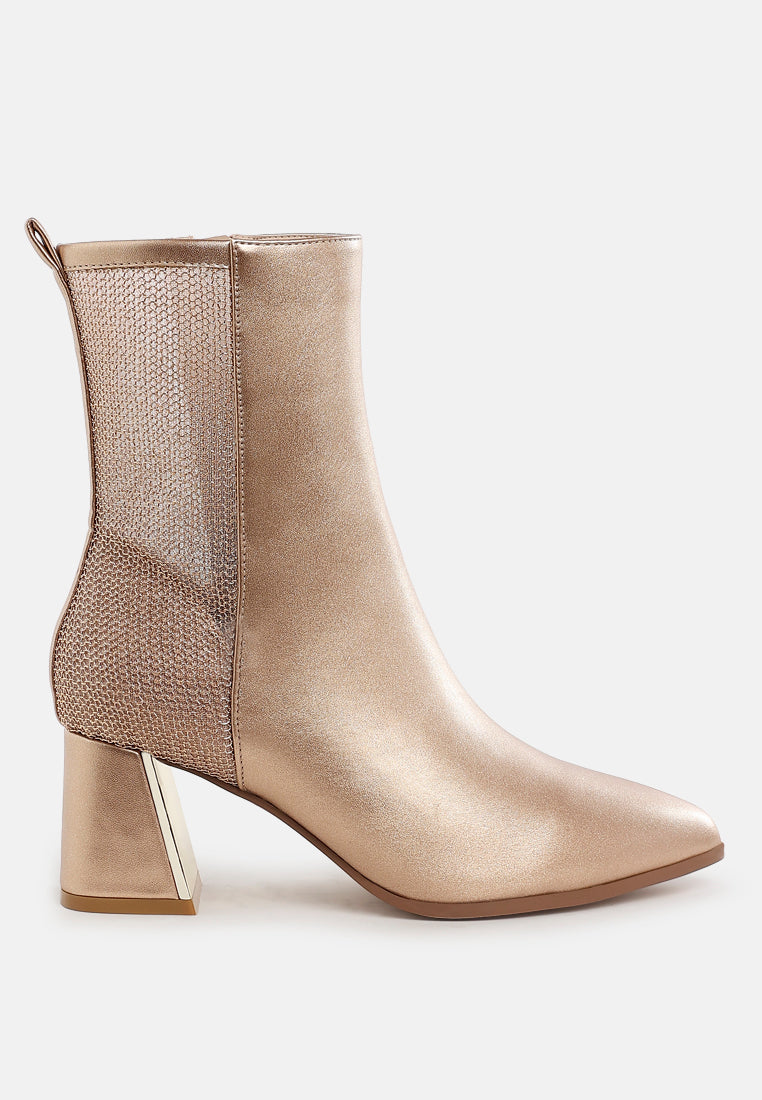 Bronze ankle boot with mesh side on a white background