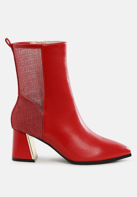 Red ankle boot with a block heel on a white background
